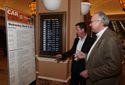 Attendees reviewing the daily schedule of events at CAR 2011.