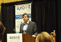 Julian Gritsch with EuroIT Technologies speaks at the Welcome Cocktail Reception, Sunday, March 11, 2012.