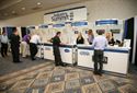 Industry Summit attendees arrived bright and early to check in and pick up their badges at the Registration Desk.