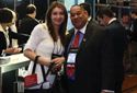 Elbi Rodriguez of Alpine Worldwide Chauffeured Services, and his companion get situated at on-site registration.