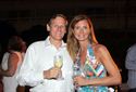 Attendees enjoy Monday night"s Island Latin Jazz White Nite on the Veranda.